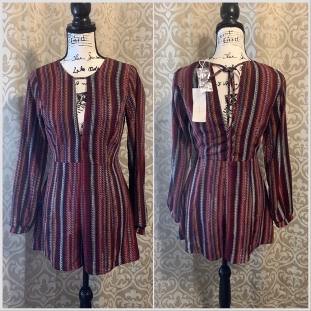 New Lush Romper with tags plunge next line lightweight comfortable with tags